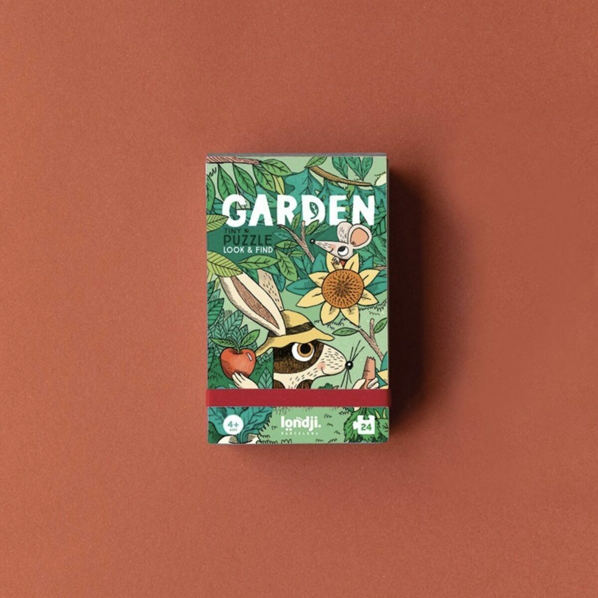 Boîte de poche blanche du Tiny Puzzle Garden de Londji illustrant un lapin et des légumes du jardin.