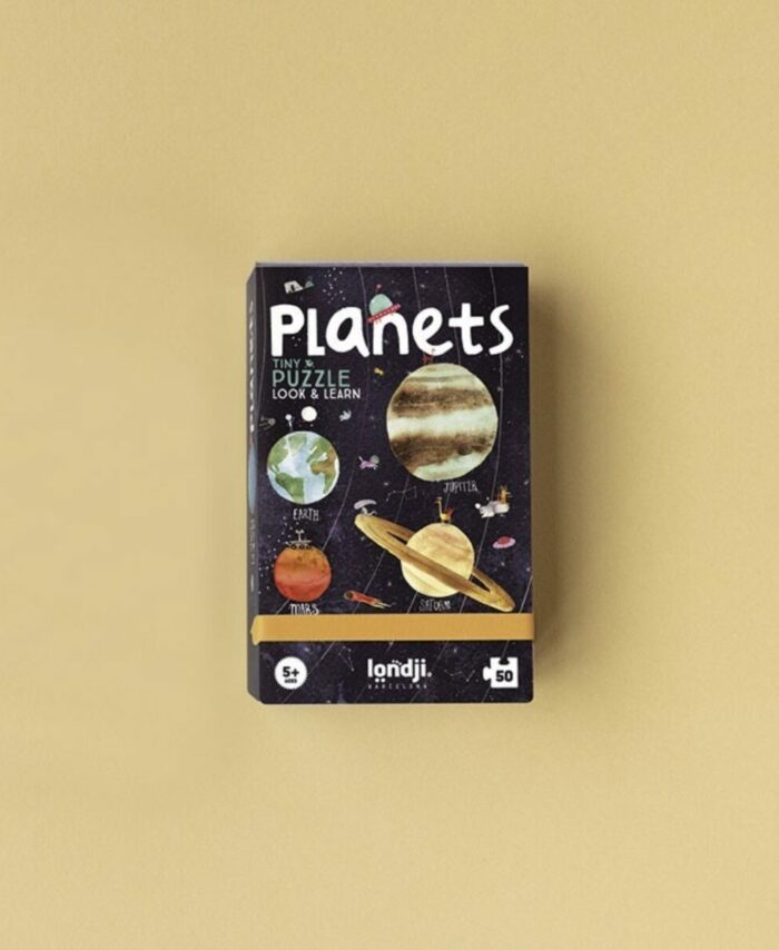 Boîte de poche blanche du Tiny Puzzle Planets de Londji illustrant la Terre et des éléments spatiaux.