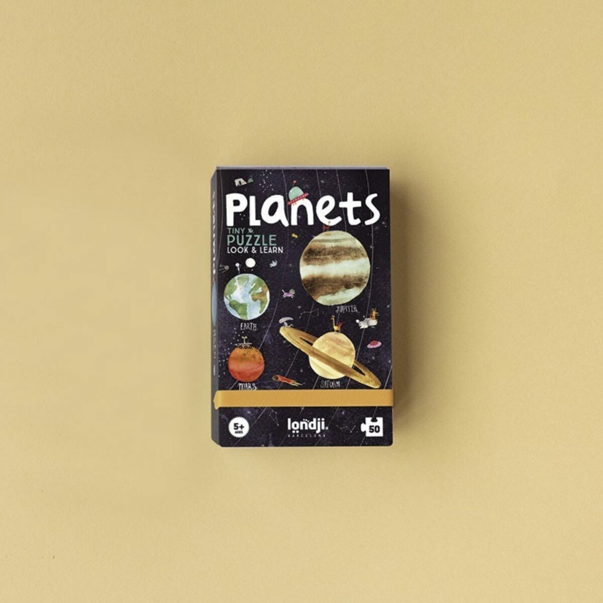 Boîte de poche blanche du Tiny Puzzle Planets de Londji illustrant la Terre et des éléments spatiaux.