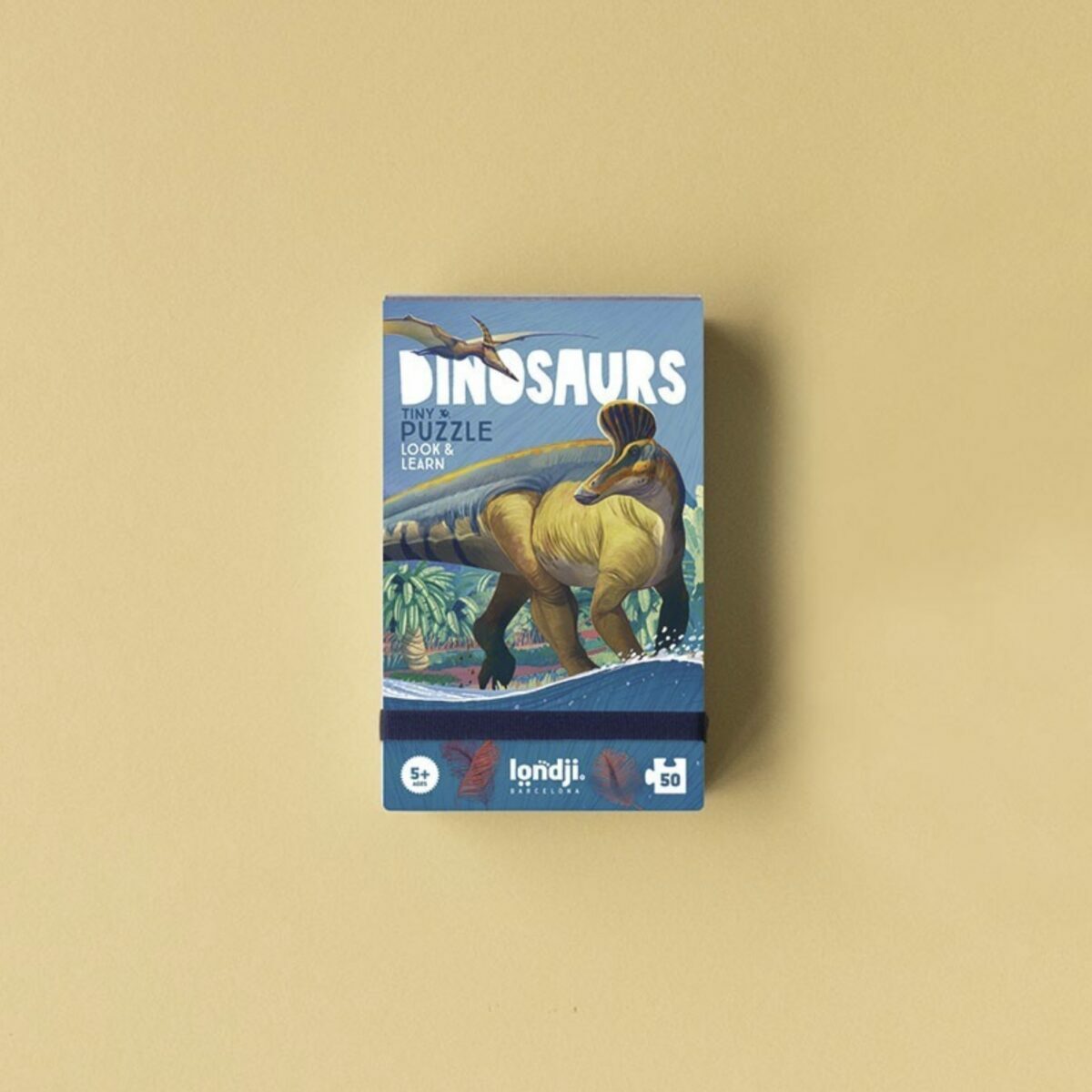 Boîte de poche blanche du Tiny Puzzle Dinosaurs de Londji avec illustration d'un T-Rex.